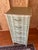 1980s French Provincial style lingerie chest that has been given an elegant update with a sage green furniture paint and...