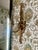 Gorgeous pair of French gilt bronze or brass double-arm wall sconces. These vintage Louis XVI style sconces feature a...