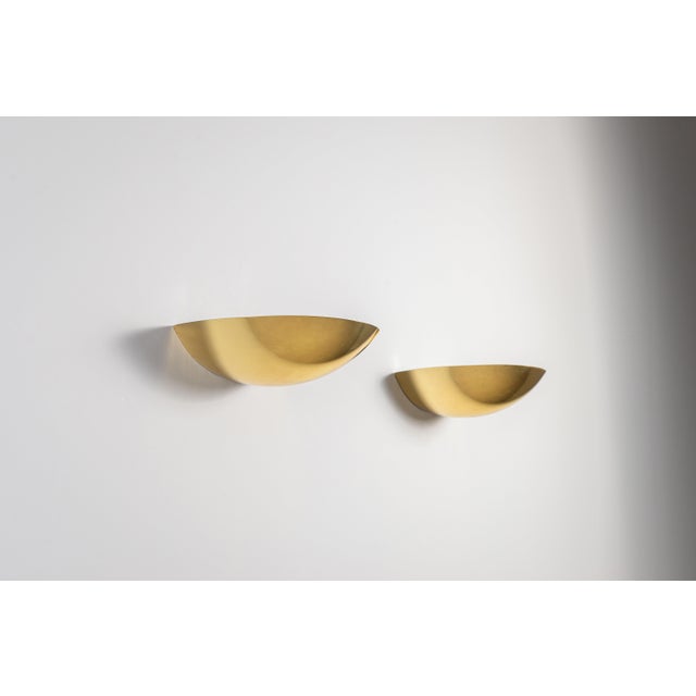 This elegant pair of vintage Model 8029 wall lamps by J.T. Kalmar reflects the refined modernism and sculptural...