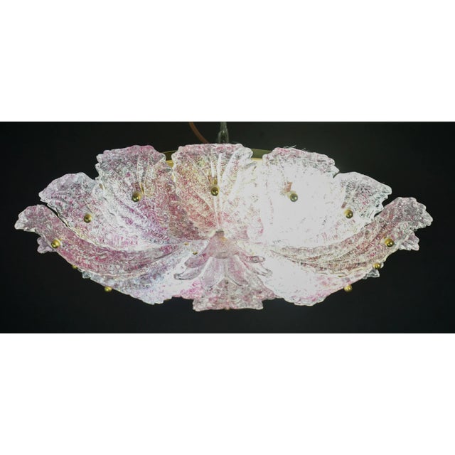 Elegant Vintage Murano ceiling light with pink glass leaves. Period: circa 1970. The ceiling light features 4 European...