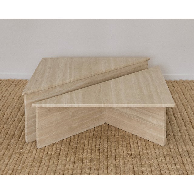Two (2) piece triangular shaped vintage travertine coffee table. The two (2) modular parts allows you to arrange the...