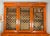 An impressive Austrian Biedermeier bookcase, circa 1840, finely constructed in richly figured maple with an architectural...