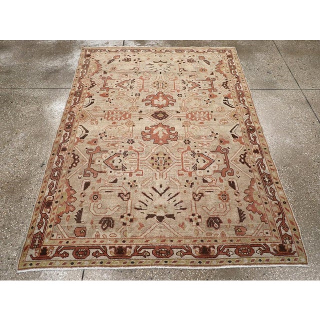 A vintage Persian Malayer accent rug. Ragged, simple palmettes, larger two-tone palmettes and still others with squared...