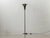 Elegant Art Deco floor lamp with classic, timeless lines and a characteristic trumpet shade. The lamp captivates with its...