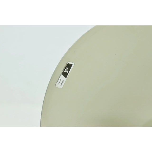 Desk/table lamp by Sis Germany from the 1950s. The lamp has a brass stern and steel lacquered adjustable shade with brass...