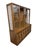 An iconic piece of American Mid-Century Modern design, this Broyhill Brasilia 2-piece walnut china cabinet showcases the...