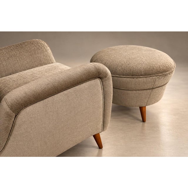 Designed by Carlo Hauner in 1950s Brazil, this armchair and matching ottoman embody the warmth and sculptural clarity of...
