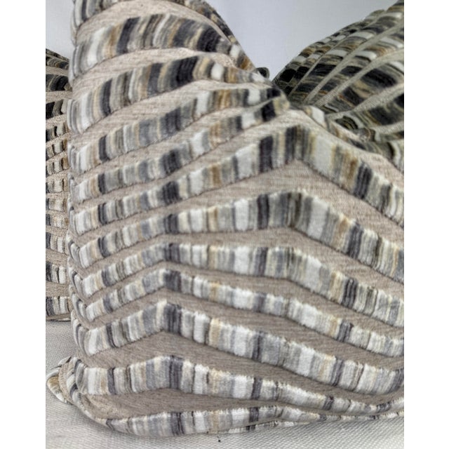 Custom pair of 22" pillows covered in Opuzen Fabric "Tazza" velvet in color granite. These pillows have tapered corners to...