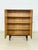 For sale is a Danish teak linen cupboard from the 1960s, whose timeless, minimalist elegance and rich, warm wood tone make...