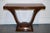 A striking Art Deco–inspired exotic Morado (rosewood) veneered console table, believed to be designed and crafted by...