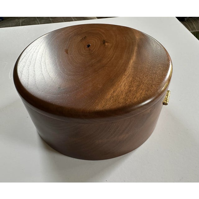 Initialed and dated by the artist. A beautiful hand-crafted round box made from local Michigan wood.