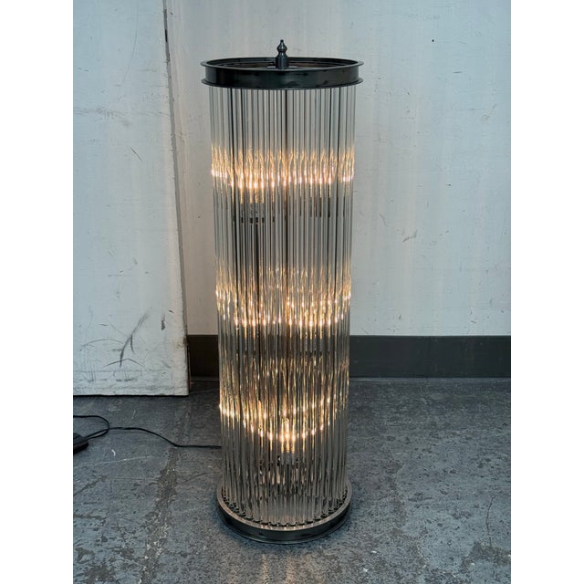 Design Plus Gallery presents a Glass Rod Floor Lamp from Wah Sing Lamp Company. This light fixture seems antique with its...