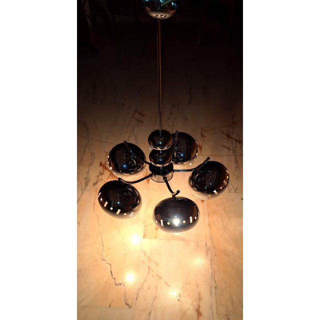 Spectacular original ceiling lamp from the Space Age (1960s/70s) with an iconic, futuristic, and atomic design. This...