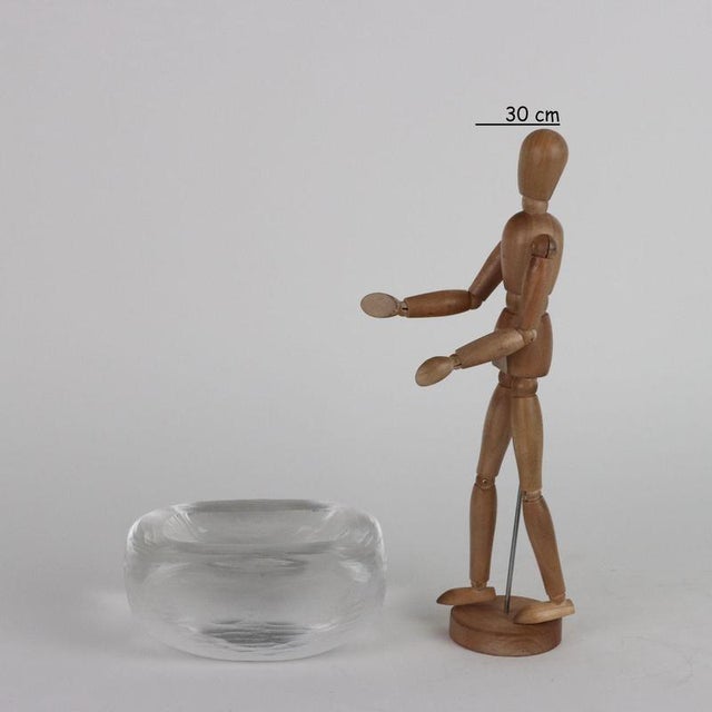 Centerpiece in heavy transparent glass, rectangular shape with a glazed beaten surface. Signature engraved under the base....