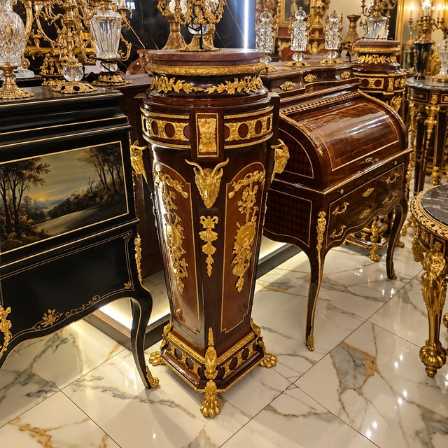 Make a bold statement with this luxurious oversized wood pedestal, exquisitely crafted with intricate gold leaf detailing,...