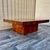 Fully Refinished Mid Century Modern Handcrafted Wood Pedestal Coffee Table. Circa 1970s Features a rich, natural two-tone...