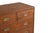 This Antique Anglo-Indian Teakwood Campaign Chest of Drawers is handcrafted from solid teakwood, featuring a classic...