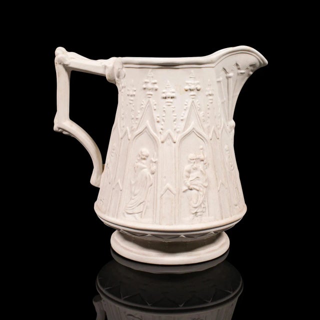This is a vintage pouring jug. An English, Parian Ware ceramic serving creamer, dating to the late 20th century, circa...