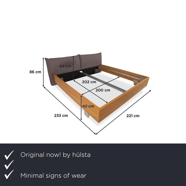 with this bed from hülsta, you're getting a bedroom piece that combines solid wood and textile comfort. The light oak...
