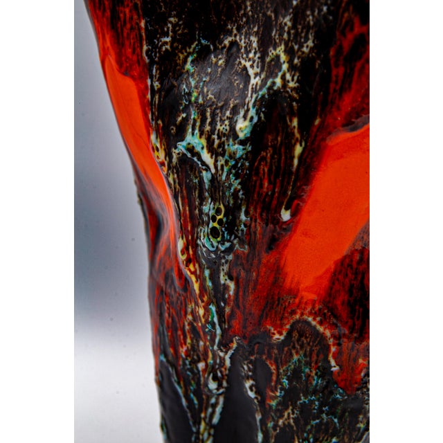 Ceramic vase in very good condition, lava decor, a little damage on the upper edge (pictures) This piece has an...