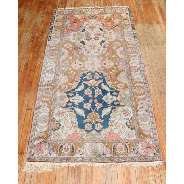 A Vintage Indian Lahore small gallery rug from the 2nd quarter of the 20th century with a large scale design . Size: 4'6''...