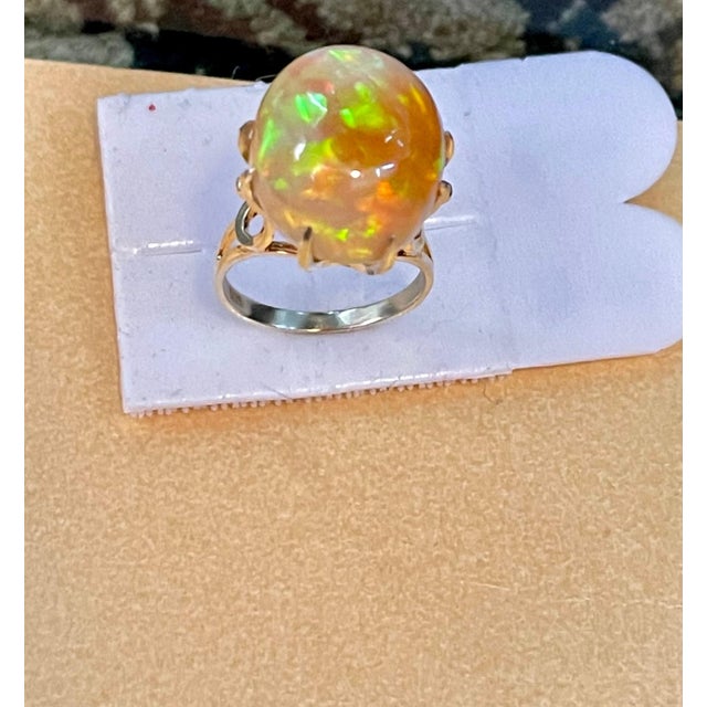 Metal 12 Carat Oval Shape Ethiopian Opal Cocktail Ring 14 Karat Yellow Gold For Sale - Image 7 of 18