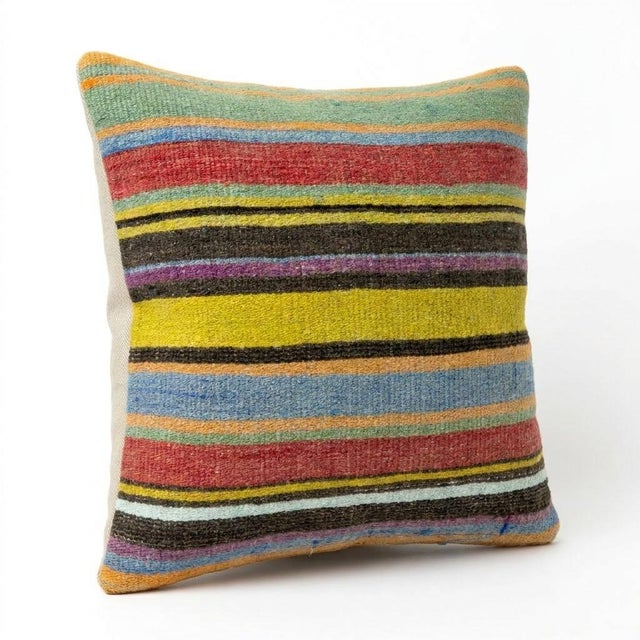 This beautiful 16'' x 16'' hand-woven Kilim pillow cover was made from an authentic Turkish kilim. The traditional flat-...