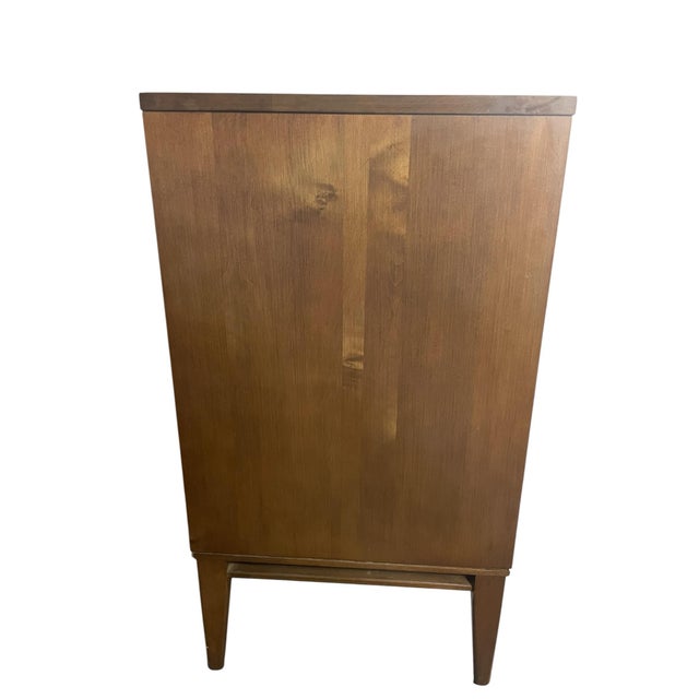 Beautiful Paul McCobb dresser. 3 drawers. Brass knobs. One knob is slightly bent that is picture. Signed with label. Some...