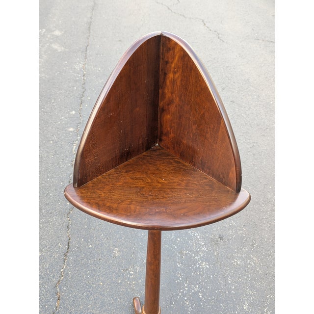 Crafted from solid Mahogany, this distinctive corner pedestal features graceful Queen Anne legs. Its unique design offers...