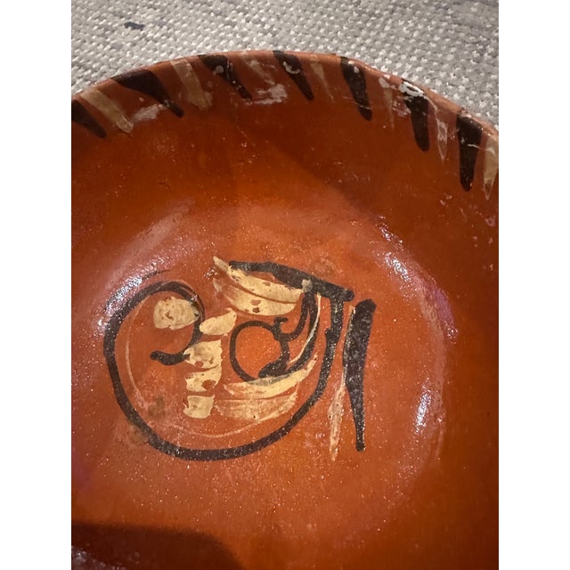 The set of 4 bowls features hand-painted drip designs in brown and white on the rims.They are classic examples of Mexican...