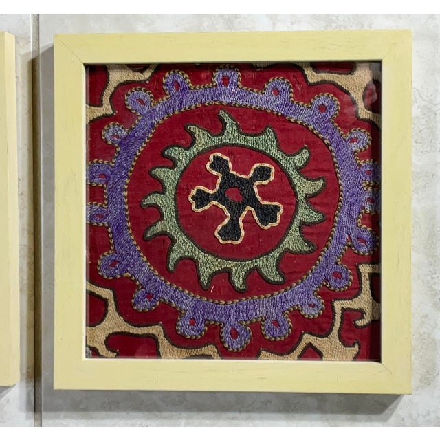 Exceptional antique hand embroidery fragments of Suzani textile, with circle of life round motif , professionally mounted...