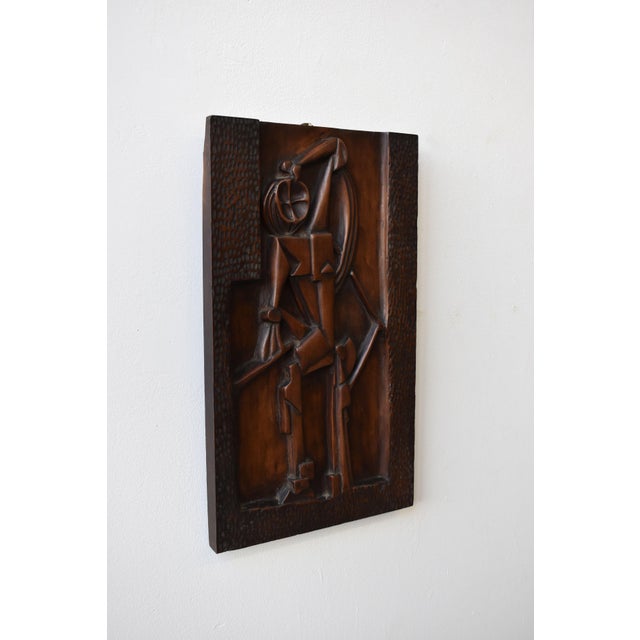 Vintage Cubist Carved Bas Relief Portrait, Circa 1940s. An exceptional work in wood, this modernist masterpiece shows a...