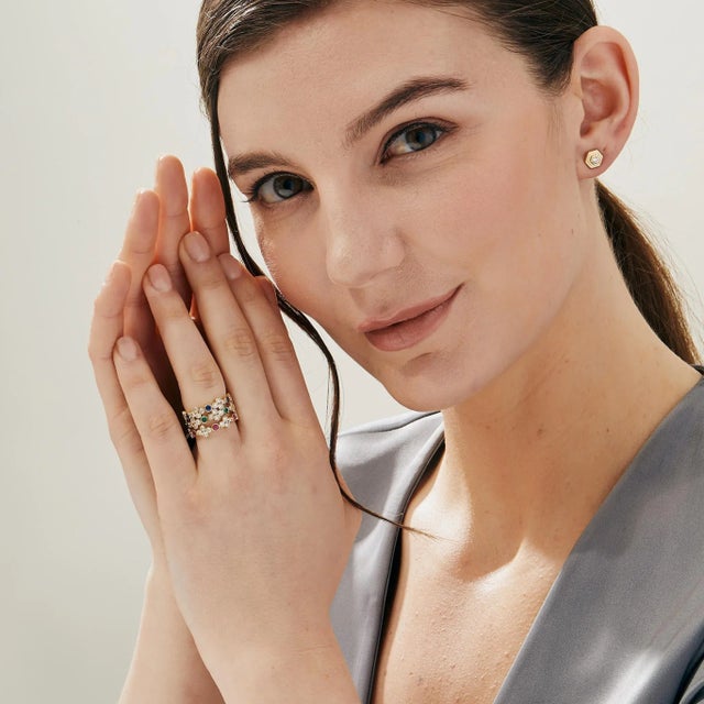 Created in 18 karat yellow gold Rubies 0.30 carat approx. Diamonds 0.50 carat approx. Rings size US 6.5 This luxurious 18...