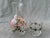 Sweet, vintage hand painted glass bedside carafe and cup set. Painted pink and green, bow, floral leaf design around both...