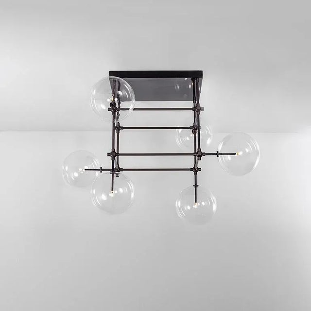 Black gunmetal 6 arm sculptural chandelier by schwung dimensions: d 117.4 x w 117.4 x h 173.1 cm materials: solid brass,...