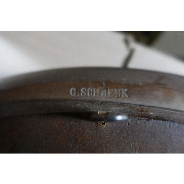 Pair of large oval frames inlaid and decorated with gilded bronzes. These frames are signed G.SCHRENK at the back....