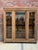 This old solid oak shop window has been completely restored. It has three large glass doors that lock and open onto three...