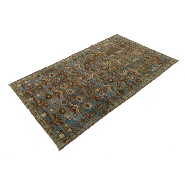 Elevate your space with this magnificent antique-inspired Bidjar wool rug, showcasing an all-over geometric floral motif...