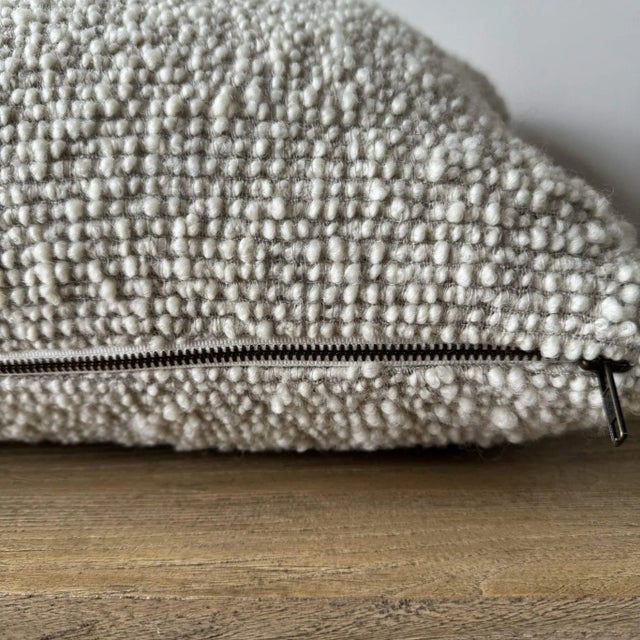 Oatmeal and natural flax wool and linen woven fibers in a stonewash finish create this luxurious soft pillow. Sewn with an...