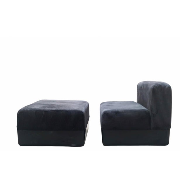 A refined and exceptional modular armchair with a matching ottoman, designed by architect Carlo Bartoli for the...