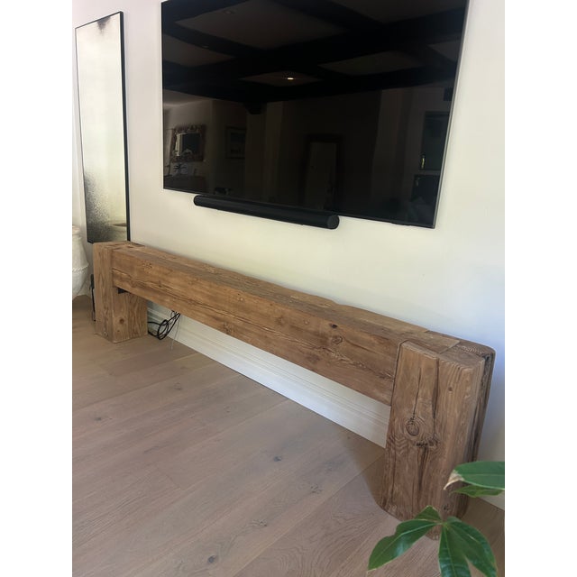From Arhaus' Ubud Collection, this console is sustainably sourced reclaimed teak wood. It features oversized exposed...