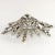 This is part of Chairish’s Costume Jewelry assortment. Glitzy starburst brooch embellished with clear rhinestones in...