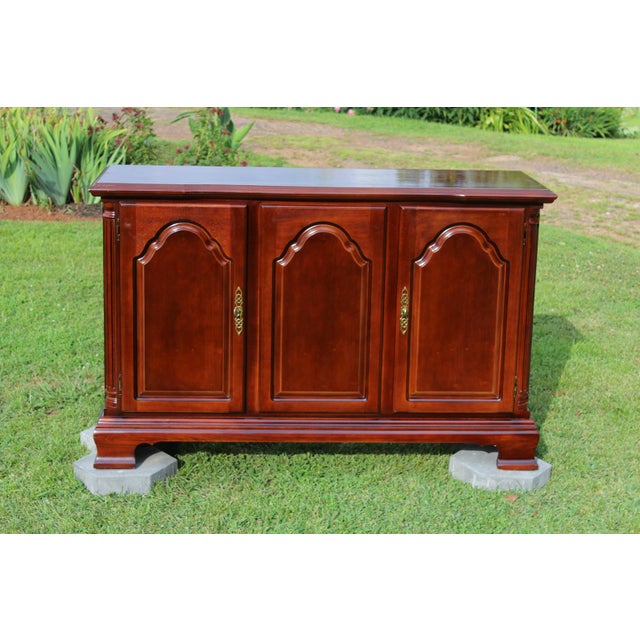 The warmth of the mahogany veneer on this buffet by Lexington is delightful, especially when bathed in subdued sunlight on...
