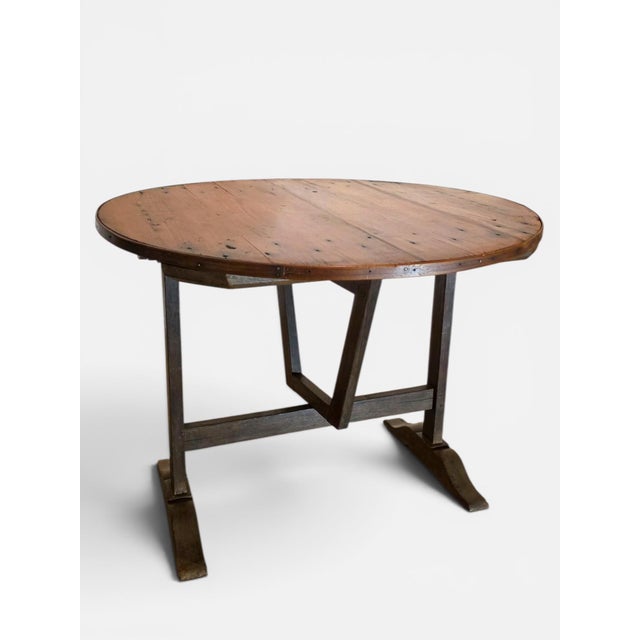 A lovely 19th century country French wine tasting table of oak and ash. Sturdy and well crafted with mortise and tenon...