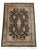 A beautifully hand-knotted Oriental area rug featuring a classic floral medallion design set against a rich black field...