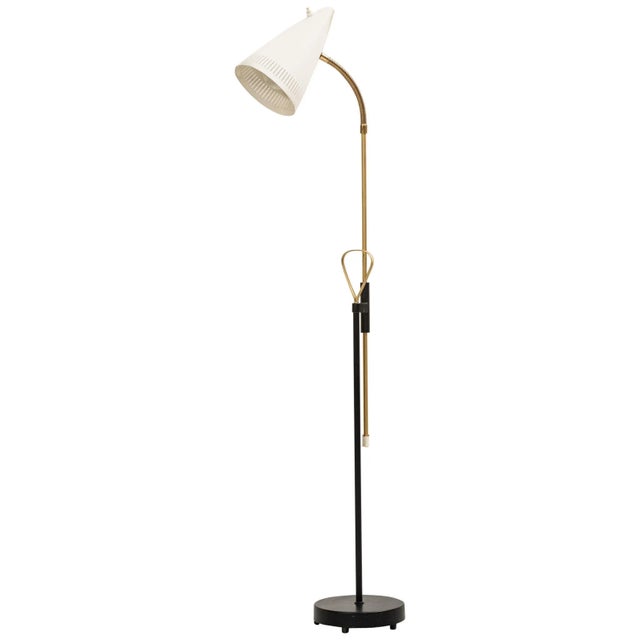 Height adjustable floor lamp model 7070. Produced by Falkenbergs belysnings AB in Sweden. European Plug (up to 250V).The...