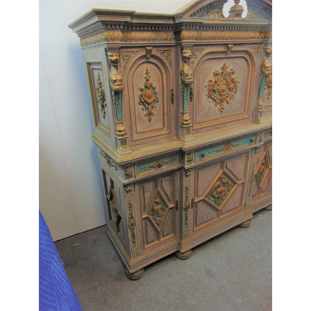 19th Century Horner Bar Cabinet . Solid oak , extensively carved with Lions heads , paw feet, fruits leaves medallions and...