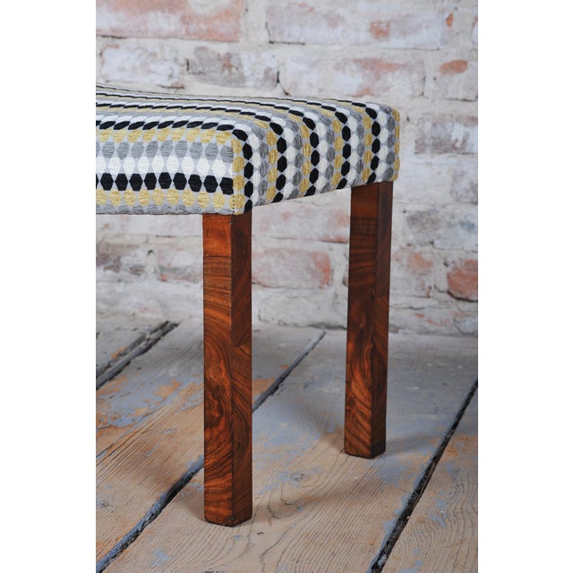 This visually appealing and shape-clean footstool in the distinct Art Deco style dates from the 1920s in Czechoslovakia....