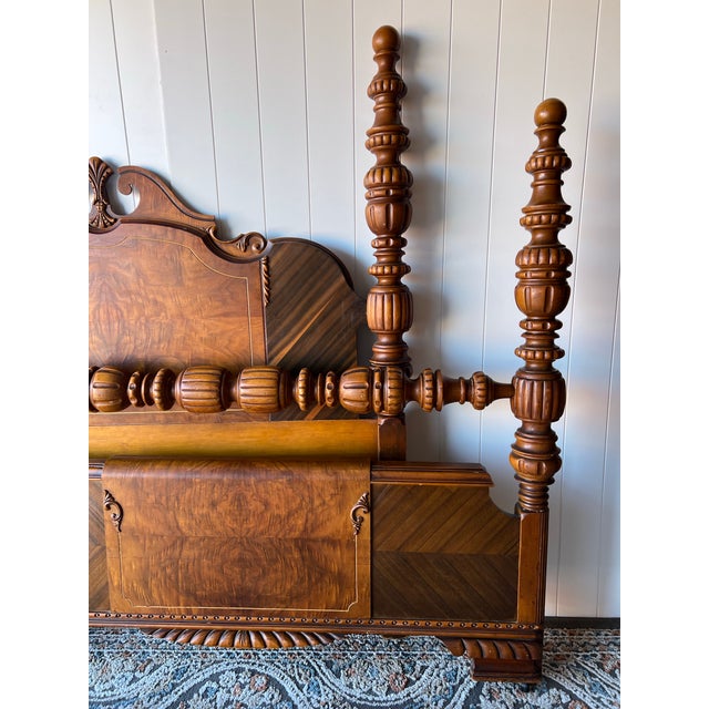 This bed showcases classic traditional craftsmanship with ornate spindle turning, architectural detailing, and a warm wood...