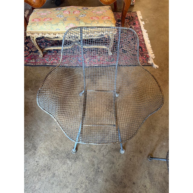 An exceptional pair of mid-century modern wire lounge armchairs heavily inspired by the iconic sculptural designs of...